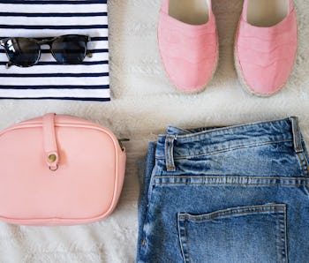 flat lay women fashion. trendy hipster clothes, accessories top view. fashion bloggers outfit collag...