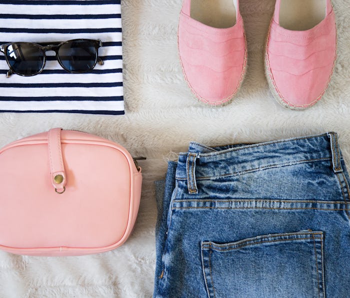 flat lay women fashion. trendy hipster clothes, accessories top view. fashion bloggers outfit collag...