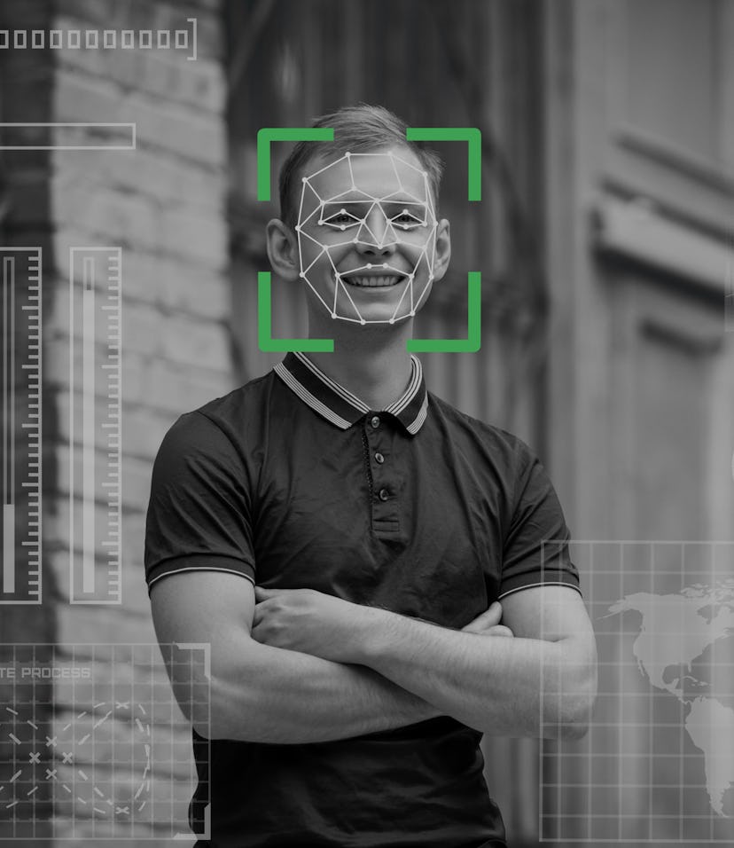 Facial recognition. Biometric verification. A modern young man. The concept of a new face recognitio...