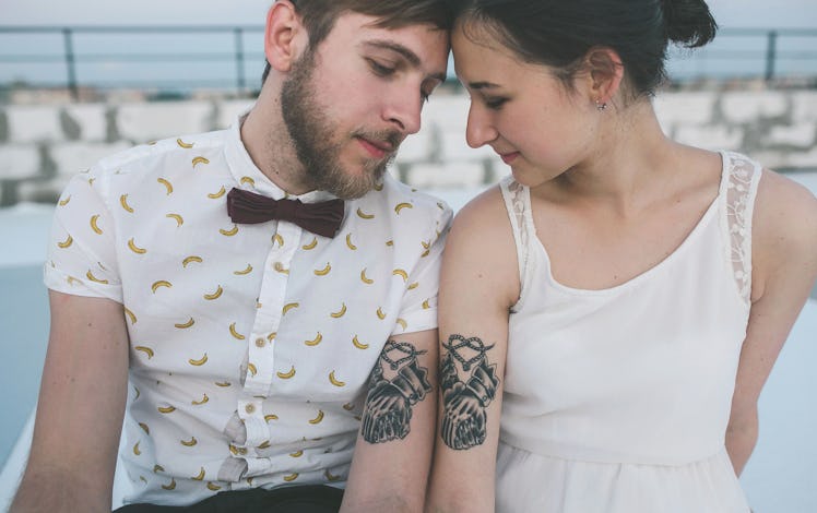 These commitment tattoos to get with your partner show that love is permanent.