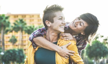 Happy gay couple having fun together outdoor - Young women having a date - Equality right, homosexua...