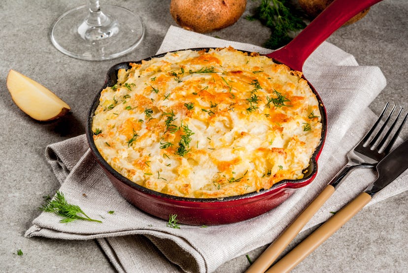 Skillet Shepherd's Pie, british casserole in cast iron pan, with minced meat, mashed potatoes and ve...
