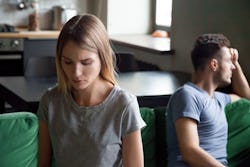 Sad depressed wife feeling upset after fight with husband, disappointed frustrated millennial girlfr...