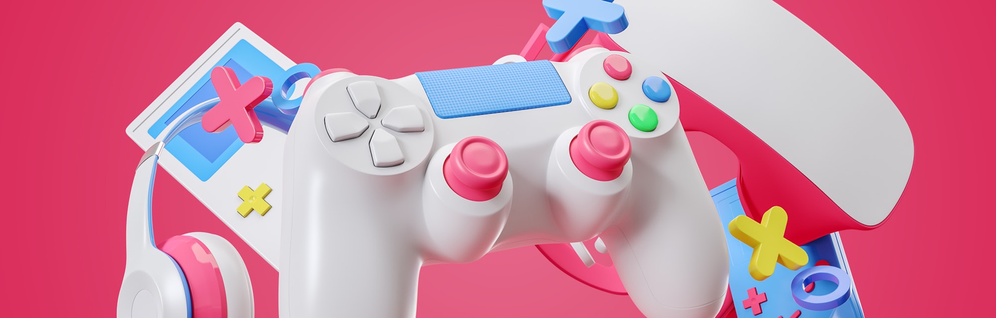 Colorful gamepad, headphones and game console hanging isolated on a pink background. Gaming concept....