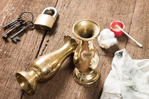 cleaning and polishing old brass jar