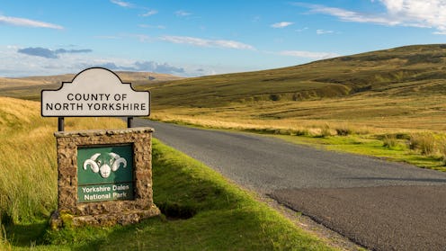 Yorkshire Dales National Park table sign next to a road