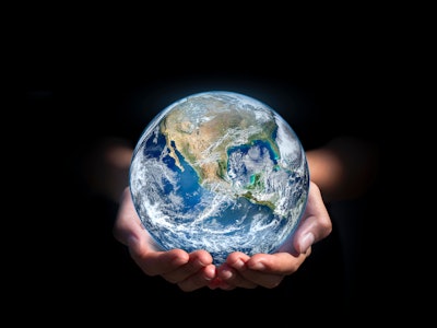 earth in hands. green planet on hand. save of earth. environment concept for background web or world...