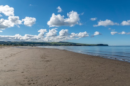 Ayr Beach, Ayrshire, Scotland, United Kingdom, October 2nd 2016. People walk on Ayr beach on a beaut...