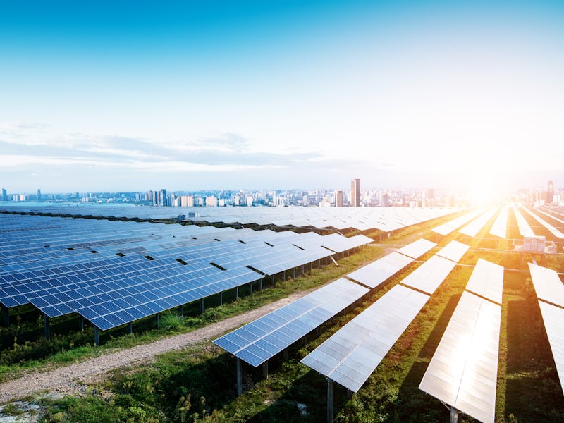solar panels with the sunny sky. Blue solar panels. background of photovoltaic modules for renewable...