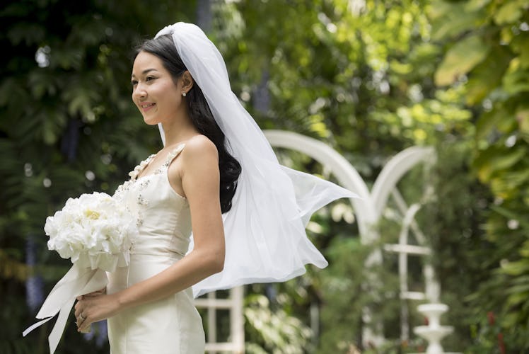 Here are the real meanings behind some popular wedding traditions.