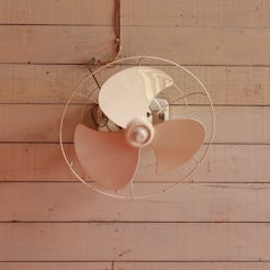 Small ceiling fan On old wooden floors.