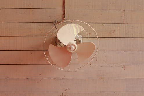 Small ceiling fan On old wooden floors.