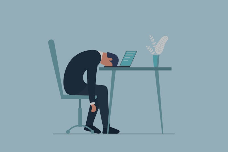 A man in an office suit can be seen having burnout at his desk. The dominant colors in this illustra...