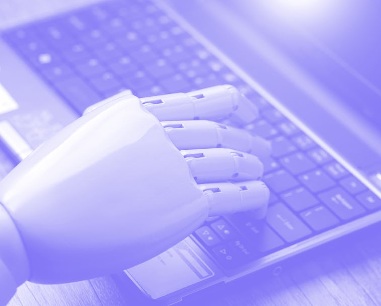 artificial intelligence hand type on keyboard