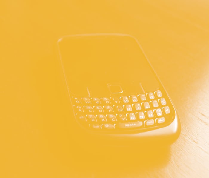 A black color Handphone with qwerty keyboard