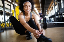 Portrait of young fitness woman in gym