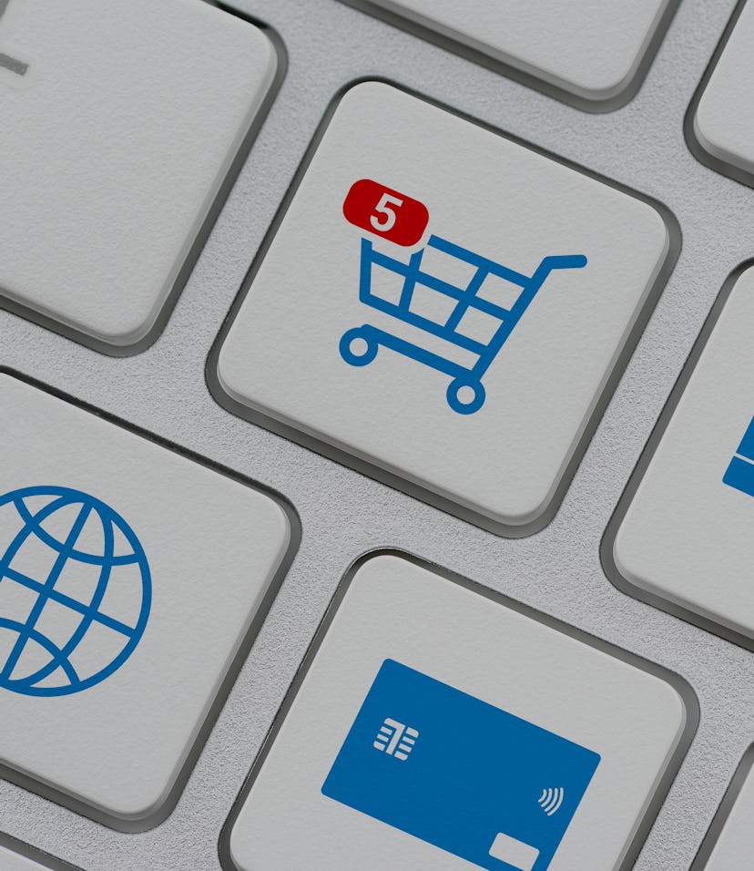 A white and blue keyboard can be seen with symbols for different types of market actions. One key sh...