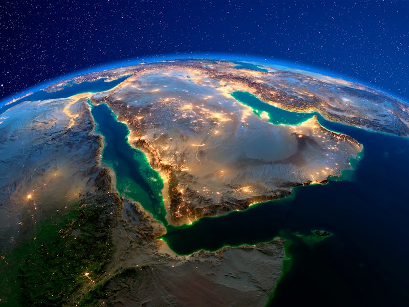 Planet Earth with detailed exaggerated relief at night lit by the lights of cities. Saudi Arabia. 3D...