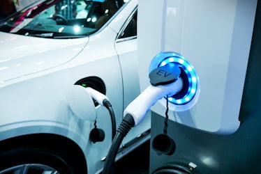 Power supply connect to electric vehicle for charge to the battery. Charging technology industry tra...