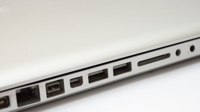 USB port with MacBook Pro on white background