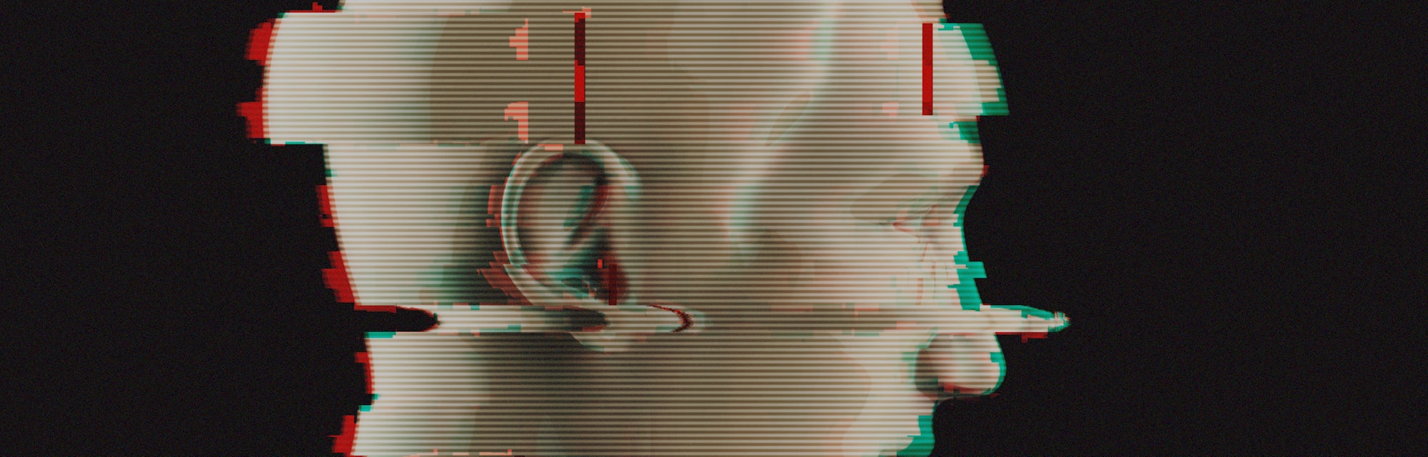 3d portrait of a man with glitch effect. Isolated on dark background