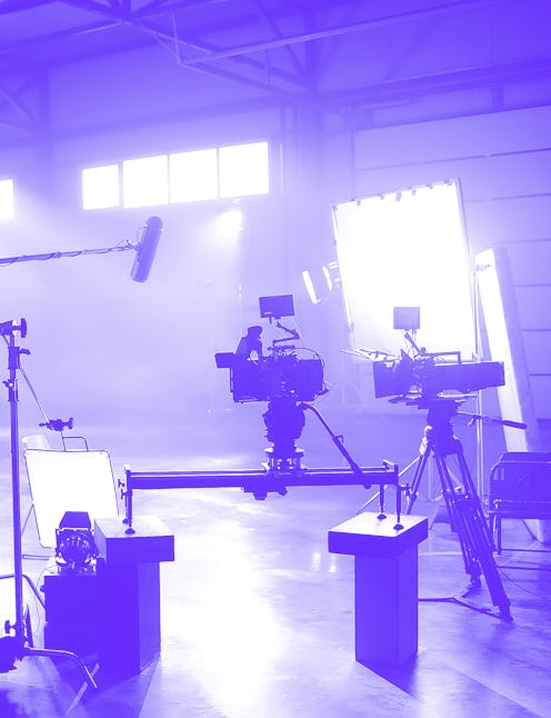 Profesional video studio.Behind-the-scenes of a video shooting.Behind the shooting production silhou...