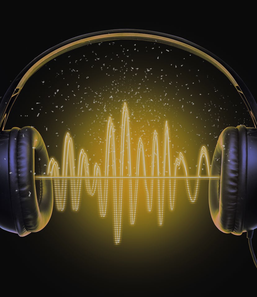 Black music headphones and sound waves with glow