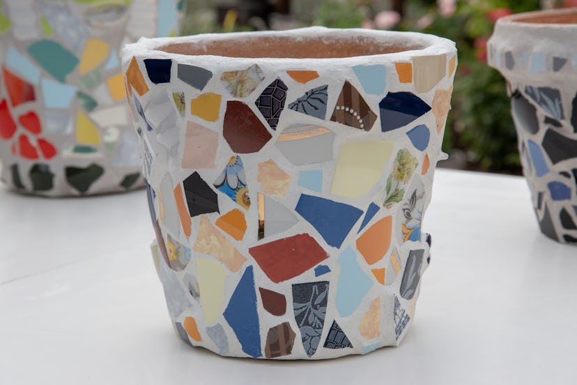 homemade mosaic flower pot with 
porcelain pieces