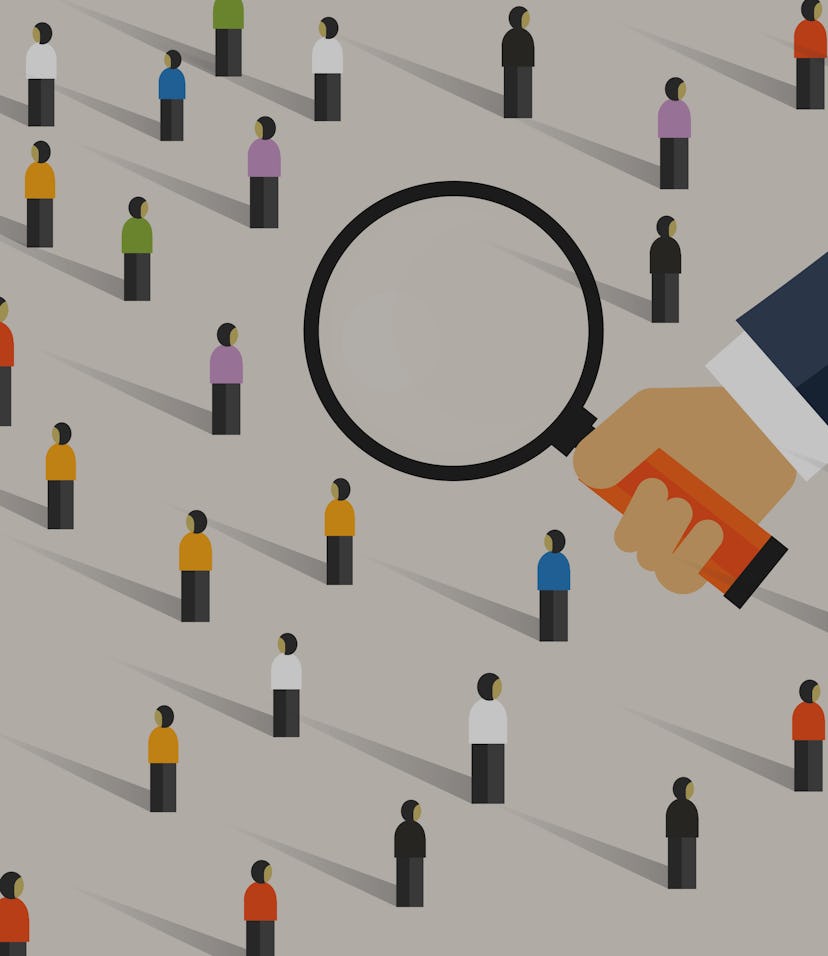 Hand magnify on crowd of people. Concept of recruitment candidate selection or market research looki...