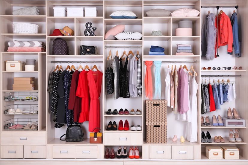 Large wardrobe with different clothes, home stuff, and shoes