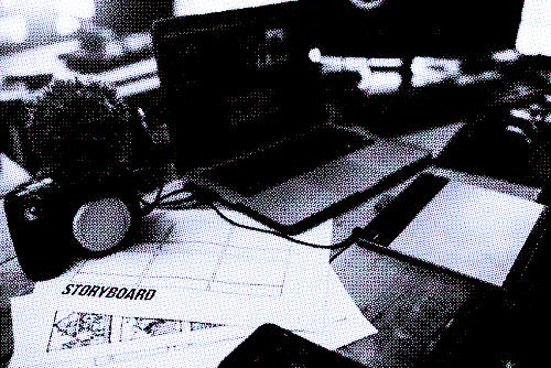 Close up storyboard content planning of production media of the Blogger or Vlog and the laptop and c...