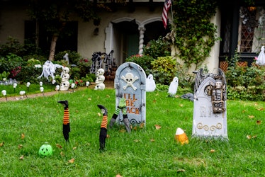 These Home Depot Halloween decorations include spooky skeletons and witches.