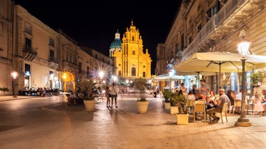 The Cathedral of San Giorgio at night in Ragusa Ibla, is the mother church of the city named after i...