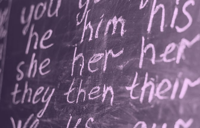 Pronouns in English. Written on a blackboard with chalk.