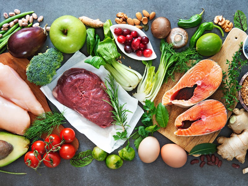 Balanced diet food background. Organic food for healthy nutrition, superfoods, meat, fish, legumes, ...