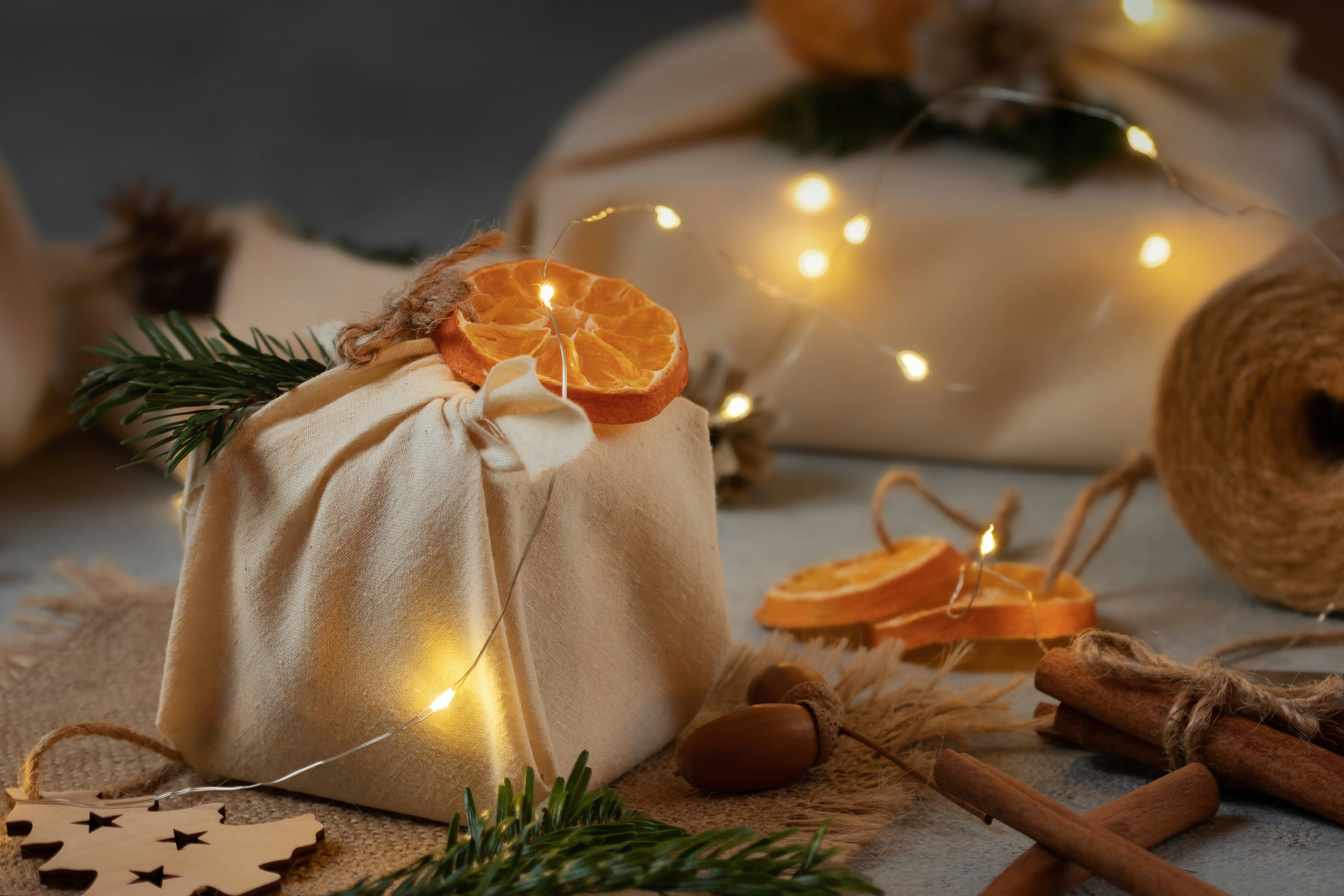 Zero waste christmas concept. Packed in natural fabric gifts and decorations from natural materials ...