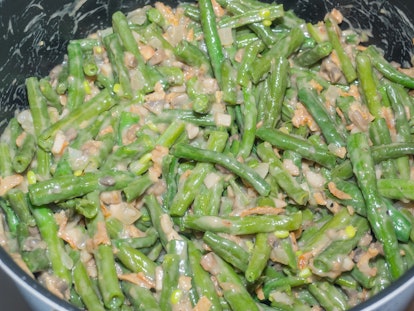Green bean casserole is a casserole consisting of green beans, cream of mushroom soup, and french fr...