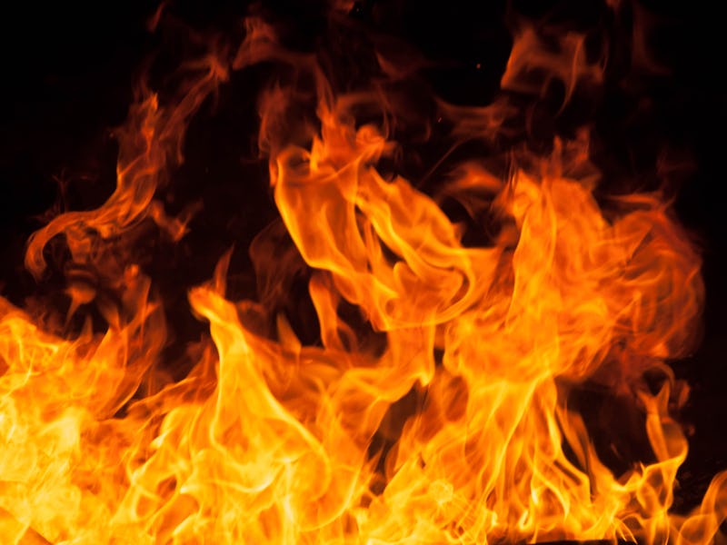 Fire creates infinity shapes when it burns. The orange from the flame and the black backgroud create...
