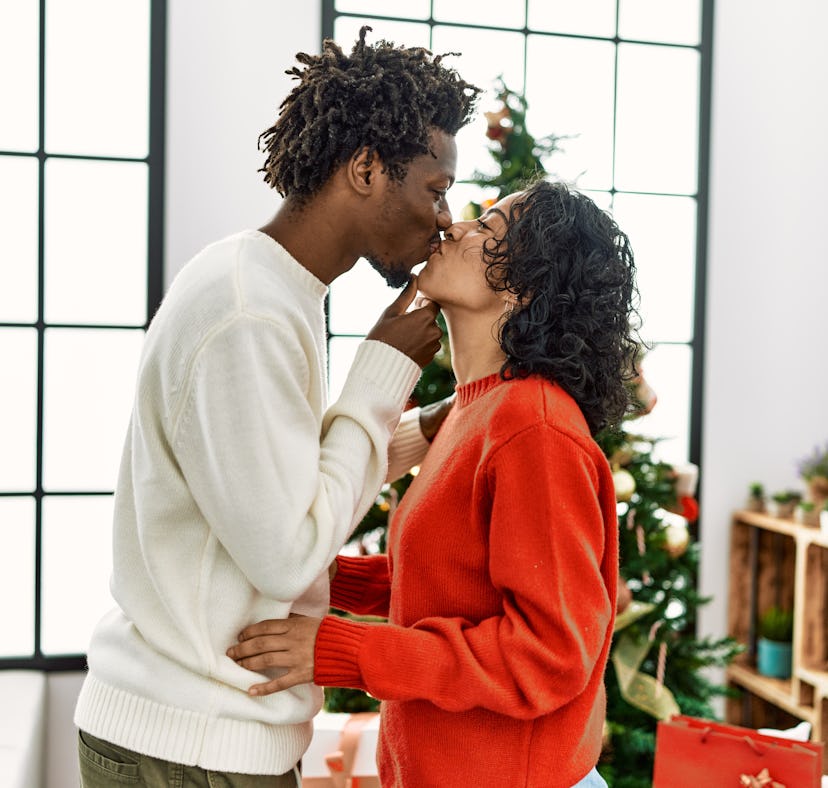 Couple spending first Christmas together.