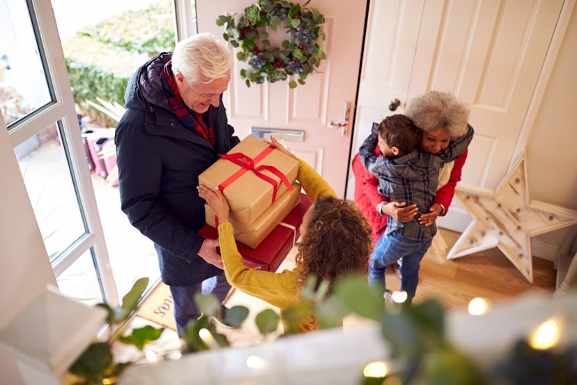 grandparents giving presents to grandkids, The average amount spent per grandchild on Christmas is $...