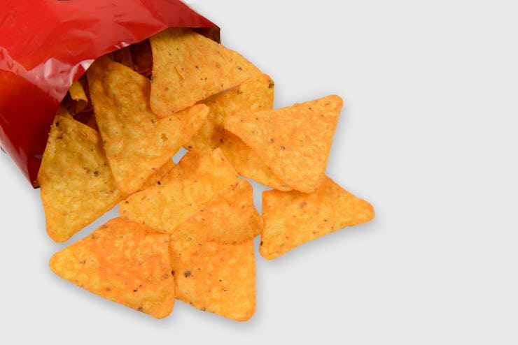 Open bag of crisps a ultra processed food