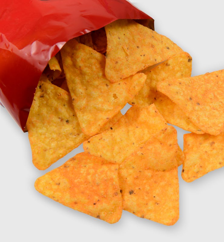 Open bag of crisps a ultra processed food