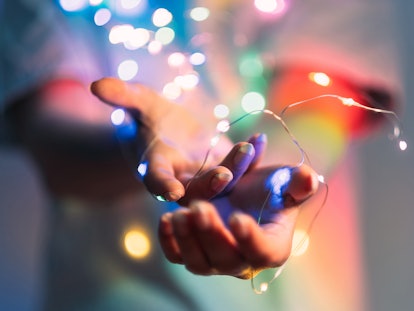 Christmas bokeh lights to look at after you read your December 20, 2021 weekly horoscope.