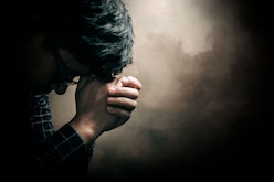 Christian life crisis prayer to god. Man Pray for god blessing to wishing have a better life. man ha...