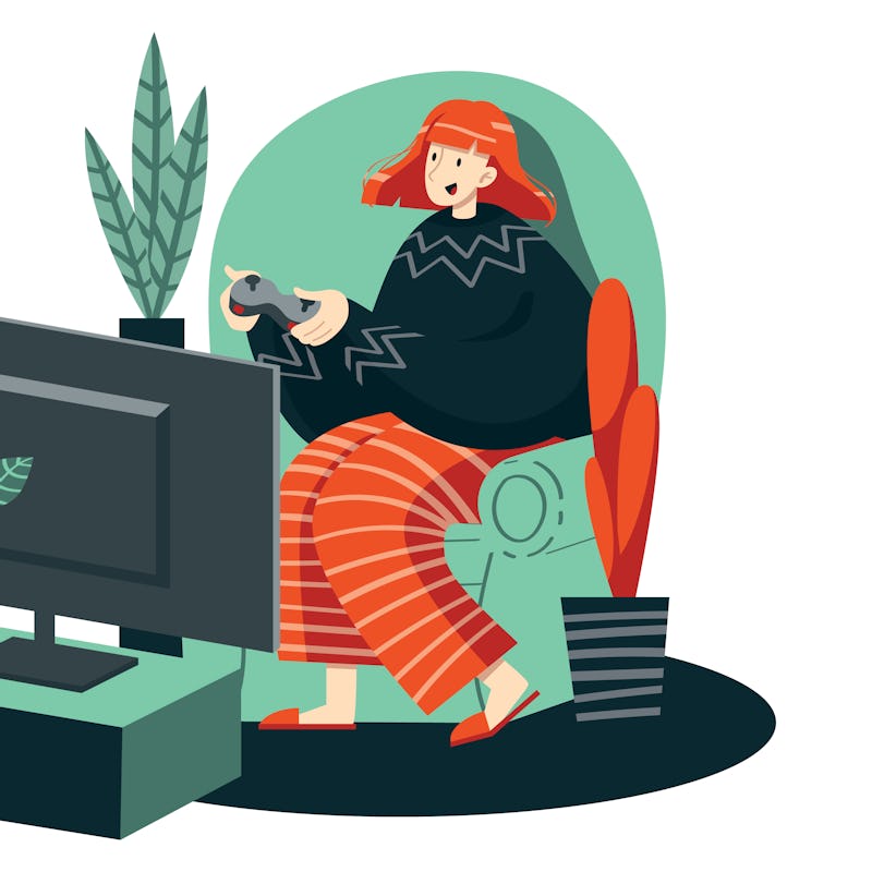 A girl plays a video game on a game console. A female gamer with a joystick in her hands plays on a ...