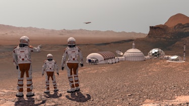 Family colonists immigrants to Mars, a man, a woman and a child admire the Martian landscape, the ci...