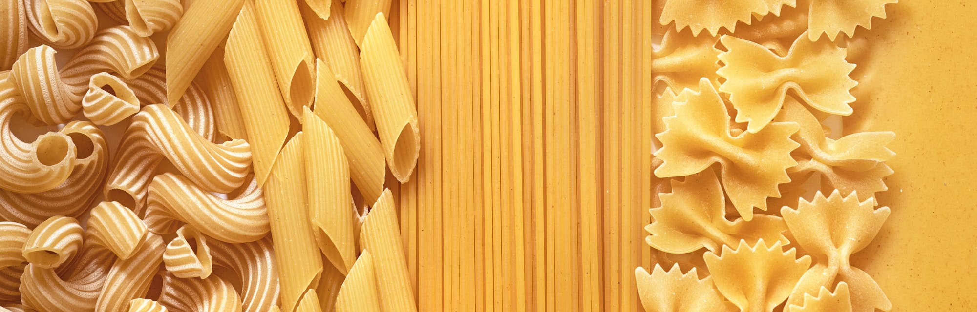 pasta background, several types of pasta close, durum wheat pasta collection, italian traditional ra...