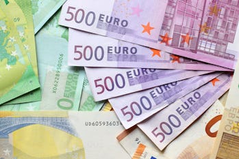 Euro currency banknotes background. European paper money backdrop with 100, 200 and 500 euros bills.