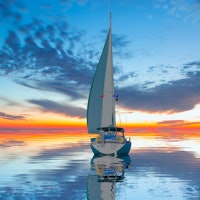 Sailing Yacht from sail regatta on mediterranean sea at sunset - Sailing luxury yacht with white sai...