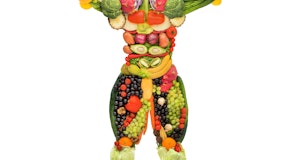 Creative diet food healthy eating concept photo of posing muscular bodybuilder made of fresh fruits ...